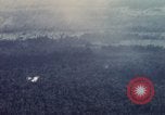 Image of Dropping of bombs by F-100 plane during Operation Attleboro Dau Tieng Vietnam, 1966, second 6 stock footage video 65675026872