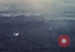 Image of Dropping of bombs by F-100 plane during Operation Attleboro Dau Tieng Vietnam, 1966, second 7 stock footage video 65675026872