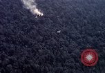 Image of Dropping of bombs by F-100 plane during Operation Attleboro Dau Tieng Vietnam, 1966, second 12 stock footage video 65675026872
