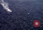 Image of Dropping of bombs by F-100 plane during Operation Attleboro Dau Tieng Vietnam, 1966, second 13 stock footage video 65675026872