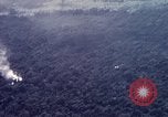 Image of Dropping of bombs by F-100 plane during Operation Attleboro Dau Tieng Vietnam, 1966, second 14 stock footage video 65675026872