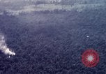 Image of Dropping of bombs by F-100 plane during Operation Attleboro Dau Tieng Vietnam, 1966, second 15 stock footage video 65675026872