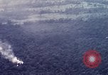 Image of Dropping of bombs by F-100 plane during Operation Attleboro Dau Tieng Vietnam, 1966, second 16 stock footage video 65675026872