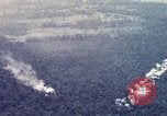Image of Dropping of bombs by F-100 plane during Operation Attleboro Dau Tieng Vietnam, 1966, second 17 stock footage video 65675026872