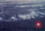 Image of Dropping of bombs by F-100 plane during Operation Attleboro Dau Tieng Vietnam, 1966, second 22 stock footage video 65675026872