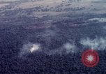 Image of Dropping of bombs by F-100 plane during Operation Attleboro Dau Tieng Vietnam, 1966, second 30 stock footage video 65675026872