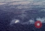 Image of Dropping of bombs by F-100 plane during Operation Attleboro Dau Tieng Vietnam, 1966, second 31 stock footage video 65675026872