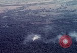 Image of Dropping of bombs by F-100 plane during Operation Attleboro Dau Tieng Vietnam, 1966, second 32 stock footage video 65675026872