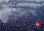 Image of Dropping of bombs by F-100 plane during Operation Attleboro Dau Tieng Vietnam, 1966, second 46 stock footage video 65675026872