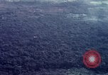 Image of Dropping of bombs by F-100 plane during Operation Attleboro Dau Tieng Vietnam, 1966, second 54 stock footage video 65675026872