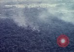 Image of Dropping of bombs by F-100 plane during Operation Attleboro Dau Tieng Vietnam, 1966, second 58 stock footage video 65675026872