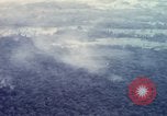 Image of Dropping of bombs by F-100 plane during Operation Attleboro Dau Tieng Vietnam, 1966, second 60 stock footage video 65675026872