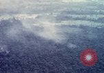 Image of Dropping of bombs by F-100 plane during Operation Attleboro Dau Tieng Vietnam, 1966, second 61 stock footage video 65675026872