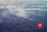 Image of Dropping of bombs by F-100 plane during Operation Attleboro Dau Tieng Vietnam, 1966, second 62 stock footage video 65675026872