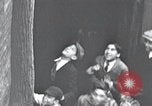 Image of cat rescued by a young man Brooklyn New York City USA, 1930, second 11 stock footage video 65675026886
