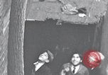 Image of cat rescued by a young man Brooklyn New York City USA, 1930, second 12 stock footage video 65675026886