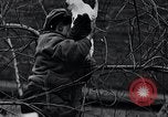 Image of cat rescued by a young man Brooklyn New York City USA, 1930, second 48 stock footage video 65675026886