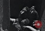 Image of cat rescued by a young man Brooklyn New York City USA, 1930, second 55 stock footage video 65675026886