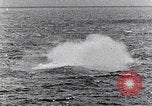 Image of a fighter jet rapidly sinking in water United States USA, 1965, second 62 stock footage video 65675027018