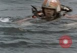 Image of jet pilot water rescue United States USA, 1965, second 12 stock footage video 65675027024