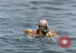 Image of jet pilot water rescue United States USA, 1965, second 36 stock footage video 65675027024