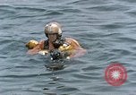 Image of jet pilot water rescue United States USA, 1965, second 38 stock footage video 65675027024