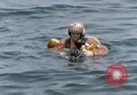 Image of jet pilot water rescue United States USA, 1965, second 41 stock footage video 65675027024