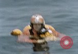 Image of jet pilot water rescue United States USA, 1965, second 43 stock footage video 65675027024