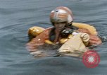 Image of jet pilot water rescue United States USA, 1965, second 47 stock footage video 65675027024