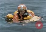 Image of jet pilot water rescue United States USA, 1965, second 48 stock footage video 65675027024