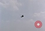 Image of jet pilot water rescue United States USA, 1965, second 60 stock footage video 65675027024