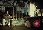 Image of M 151 armored jeep Saigon Vietnam, 1967, second 25 stock footage video 65675027026