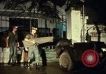 Image of M 151 armored jeep Saigon Vietnam, 1967, second 26 stock footage video 65675027026