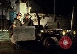 Image of M 151 armored jeep Saigon Vietnam, 1967, second 29 stock footage video 65675027026