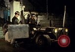 Image of M 151 armored jeep Saigon Vietnam, 1967, second 30 stock footage video 65675027026