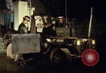 Image of M 151 armored jeep Saigon Vietnam, 1967, second 31 stock footage video 65675027026