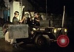 Image of M 151 armored jeep Saigon Vietnam, 1967, second 32 stock footage video 65675027026
