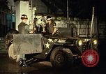 Image of M 151 armored jeep Saigon Vietnam, 1967, second 35 stock footage video 65675027026