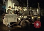 Image of M 151 armored jeep Saigon Vietnam, 1967, second 36 stock footage video 65675027026
