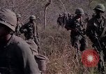Image of United States soldiers on patrol in Vietnam War Vietnam, 1967, second 12 stock footage video 65675027034