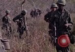 Image of United States soldiers on patrol in Vietnam War Vietnam, 1967, second 14 stock footage video 65675027034