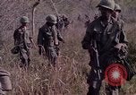 Image of United States soldiers on patrol in Vietnam War Vietnam, 1967, second 15 stock footage video 65675027034