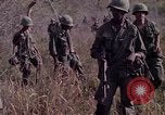 Image of United States soldiers on patrol in Vietnam War Vietnam, 1967, second 16 stock footage video 65675027034