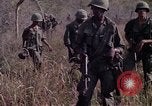Image of United States soldiers on patrol in Vietnam War Vietnam, 1967, second 17 stock footage video 65675027034