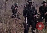 Image of United States soldiers on patrol in Vietnam War Vietnam, 1967, second 18 stock footage video 65675027034