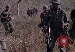 Image of United States soldiers on patrol in Vietnam War Vietnam, 1967, second 21 stock footage video 65675027034