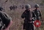Image of United States soldiers on patrol in Vietnam War Vietnam, 1967, second 23 stock footage video 65675027034