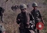 Image of United States soldiers on patrol in Vietnam War Vietnam, 1967, second 24 stock footage video 65675027034