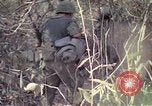 Image of United States soldiers on patrol in Vietnam War Vietnam, 1967, second 34 stock footage video 65675027034