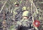 Image of United States soldiers on patrol in Vietnam War Vietnam, 1967, second 43 stock footage video 65675027034